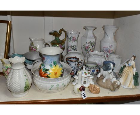 A GROUP OF CERAMIC ORNAMENTS FROM NAMED MANUFACTURERS to include a  Poole pottery conch shell centrepiece (chip on the one si