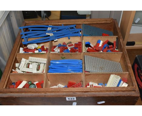 A WOODEN BOX OF VINTAGE LEGO, assorted play worn pieces including small base boards, wheels and train track, sorted into a tw