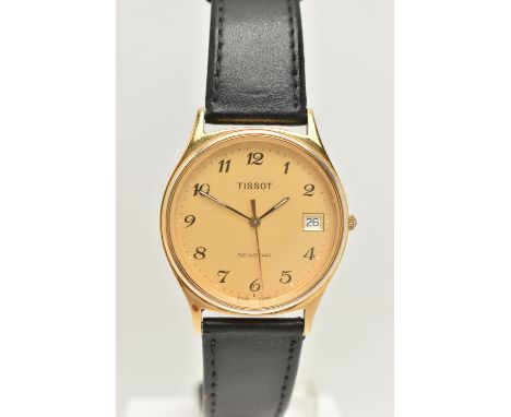 A GENTS GOLD PLATED 'TISSOT' WRISTWATCH, quartz movement, round gold tone dial signed 'Tissot Seastar', Arabic numerals, date