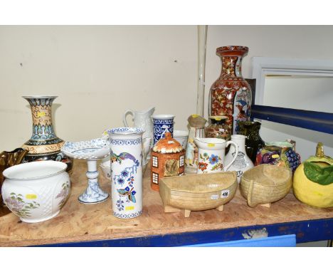 A GROUP OF WATER JUGS, PLANTERS, AND VASES to include a Beswick copper lustre fan vase, a Falcon Ware vase with an oriental b