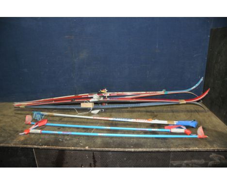 TWO SETS OF SKIS AND POLES comprising of a pair of Fischer Step and a pair of Trak Engadin skis and Equipe and Cober poles