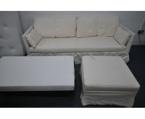 AN IKEA METAL FRAMED SOFA, length 214cm x depth 81cm x height 71cm, along with two footstools (condition report: covers ideal