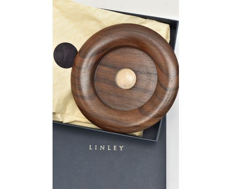 A BOXED 'DAVID LINLEY' WINE BOTTLE COASTER, walnut wine bottle coaster with silver plaque, hallmarked 'DL' Edinburgh, approxi