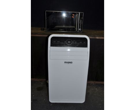 A RHINO 9000 PORTABLE AIR CON UNIT with outlet pipe and a Kenwood microwave (both PAT pass and working)