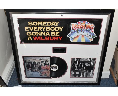 A FRAMED AND SIGNED TRAVELLING WILBURY'S Album, Bob Dylan, George Harrison, Roy Orbison, Jeff Lynne and Tom Petty with a Phot