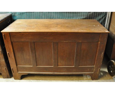 18th Century oak coffer having four fielded panels to the front on square legs and bracket feet.(B.P. 21% + VAT) 