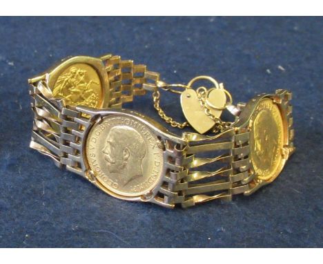9ct gold gate bracelet set with three gold sovereigns. Approx weight in total 46 grams. (B.P. 21% + VAT)&nbsp;&nbsp;Approx. 1