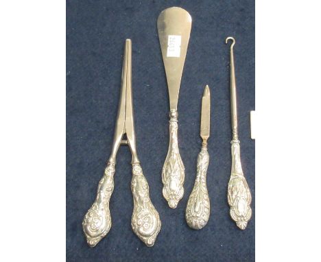 Silver handled glove stretchers with matching shoe horn, nail file and button hook. Birmingham hallmarks. (B.P. 21% + VAT)