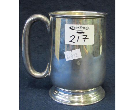 Silver pint tankard with circular stepped base. Birmingham 1958. 258g approximately. (B.P. 21% + VAT) No engravings. Hallmark