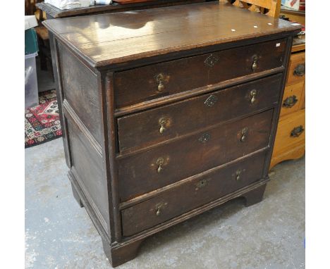 17th Century style oak straight front chest of four drawers on a projecting base and bracket feet. (B.P. 21% + VAT)&nbsp;Loss