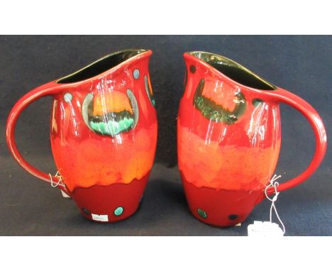 Pair of Poole pottery Volcano single handled vases, 22cm high approx. (2) (B.P. 21% + VAT)&nbsp;21.5 cm high approx. No obvio