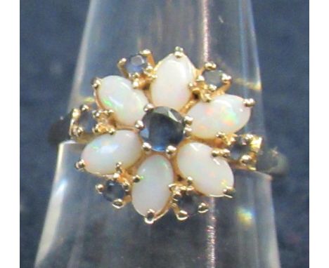 14ct gold opal and sapphire ring. 3.4g approximately. Ring size N 1/2. (B.P. 21% + VAT)&nbsp;Condition good. No obvious damag