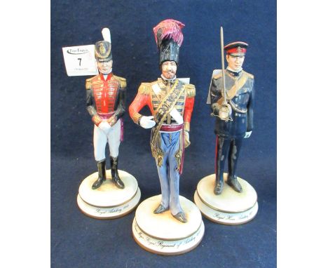 Three Michael Sutty porcelain military figurines to include; Royal Artillery 1815, Royal Horse Artillery 1970 and Drum Major 