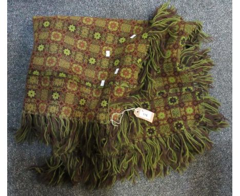 Vintage green ground woollen tapestry blanket or bed spread with fringed ends. (B.P. 21% + VAT)Bit worn, no obvious damage. N