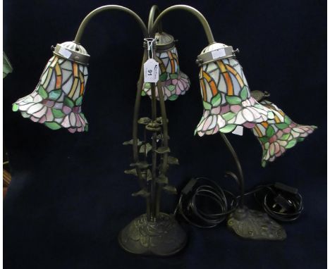 Modern three section Tiffany style table lamp with rose and foliage design, together with a similar matching single table lam
