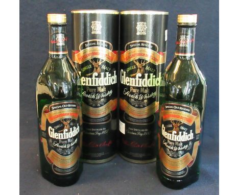 Two Glenfiddich single malt Scotch whisky bottles in original tubular case, both 1L. (2) (B.P. 21% + VAT)&nbsp;&nbsp;Seals of