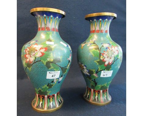 Pair of Chinese cloisonne vases on a light blue ground with floral and foliate decoration. (2) (B.P. 21% + VAT)&nbsp;32 cm hi