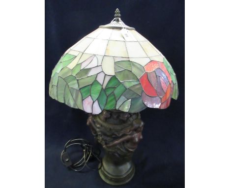 Tiffany style floral table lamp, the base with bronzed finish, classical moulded semi-nude figurines and mask heads. (B.P. 21