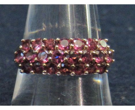 9ct gold amethyst cluster ring. Ring size P. 2.3g approximately.(B.P. 21% + VAT) 