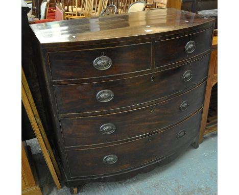 Early 19th Century mahogany inlaid bow front chest of two short and three long drawers on outswept bracket feet. (B.P. 21% + 