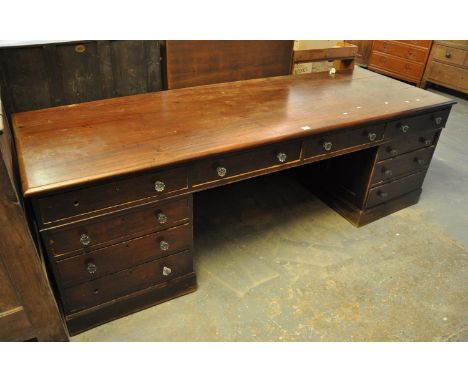 Late Victorian mahogany solicitors twin pedestal desk, having glass fluted handles and three drawers to each pedestal. 240 x 