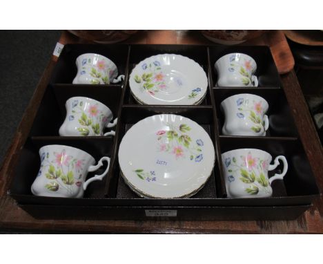 Six cups and saucers, boxed, Richmond fine bone china 'Wild Anemone' pattern.(B.P. 21% + VAT) 