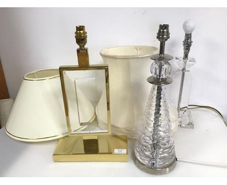 A collection of table lamps including a cut glass in the form of a Lighthouse (h.42cm), another of candlestick form and a fur