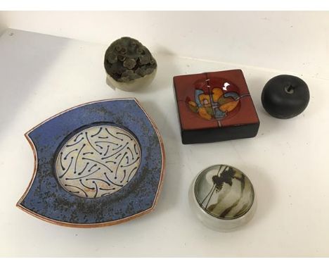 A ceramic ashtray with abstract design (5cm x 12cm x 12cm), a ceramic dish stamped Morgen Hall to base, a lidded dish and a c