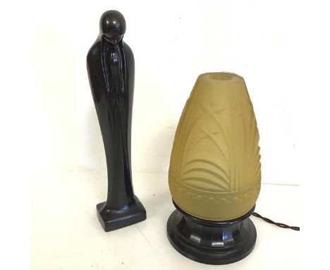 An Art Deco table lamp with conical glass shade on black glass base, some chips to shade (26cm) and a black ceramic figure of