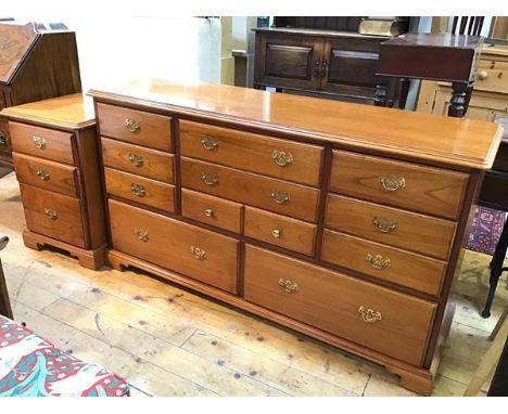 A modern chest of drawers with an arrangement of nine drawers, stamped Younger, Furniture to interior, together with matching