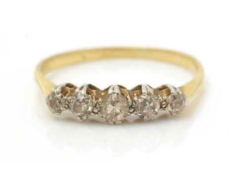 A five stone diamond ring, the graduated diamonds weighing a total of approximately 0.45carats, in 18ct yellow gold mount and