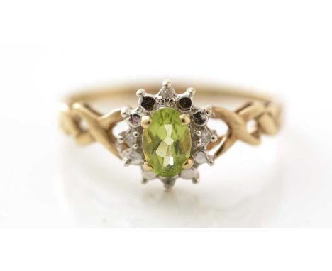 A peridot and diamond cluster ring, in 9ct yellow gold mount and shank, ring size P.