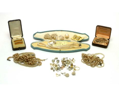 A cased two-strand pearl necklace with a precious white-metal clasp, marked '9ct', retailed by The Northern Goldsmiths, toget