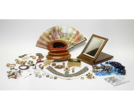 A collection of costume jewellery and dressing accessories, including a selection of brooches and necklaces, a Sorrento souve