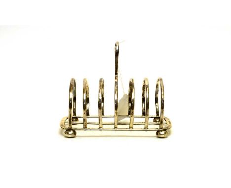 A silver seven bar toast rack, by William Batt &amp; Sons, Sheffield 1909, 4.1oz. 