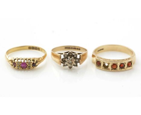 A ruby and diamond ring, in 18ct gold mount and shank, ring size P, 2.2g gross; a diamond cluster ring, in 9ct gold mount and