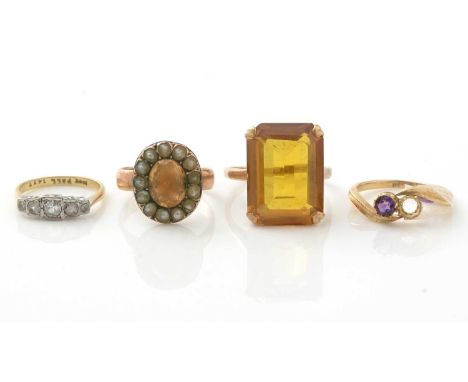 A citrine ring, 9ct gold shank; a five stone ring; an amethyst ring; and another, 18.0g gross. 