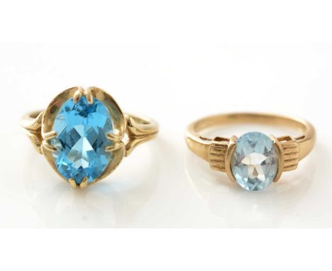 Two blue topaz rings, in 9ct yellow gold mounts and shanks, ring size N/R.