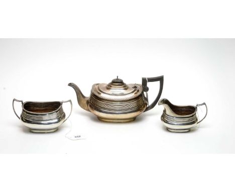 A silver three-piece tea service, by E Silver &amp; Co, Sheffield 1946/51, with gadrooned rims and fluted bands, 33.2oz. gros