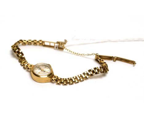 A Rotary 21 Jewels 9ct yellow gold cased manual wind wristwatch, on gold bracelet strap, 10.8g gross.
