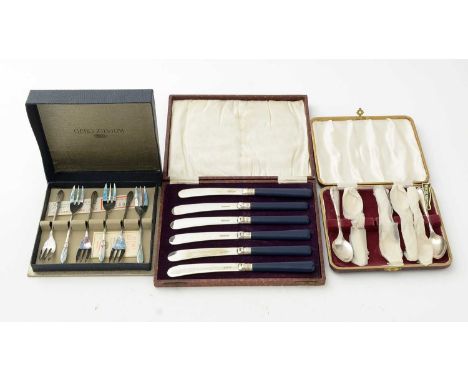 A set of six silver teaspoons, by Edward Viners, cased; Gero plated cake forks, cased; and six tea knives, cased. 