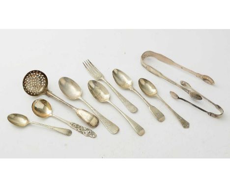 A selection of silver items including: sifting ladle, sugar tongs, teaspoons, and a fork, 9.1oz gross. 