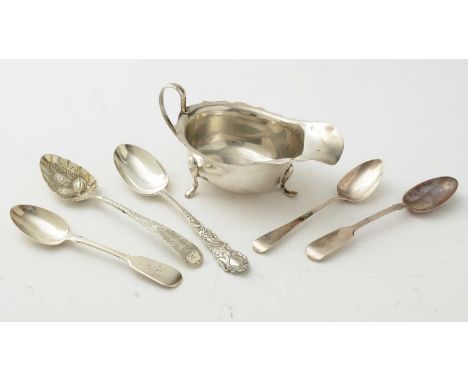 A silver sauce boat, of plain form; together with five decorative silver spoons, 7.3oz. gross.