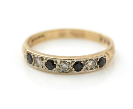 Seven stone sapphire and diamond ring, set with four sapphires and three diamonds, in 9ct yellow gold mount and shank, ring s