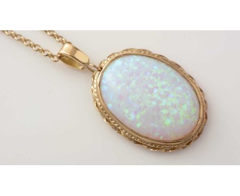 A synthetic opal pendant, the oval cabochon in 9ct yellow gold mount and chain, 10.1g gross.