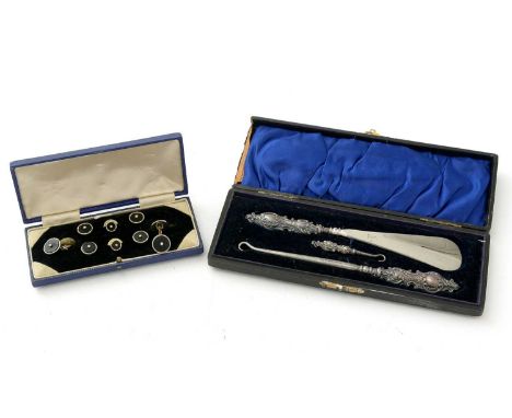 A set of gilt metal, onyx and seed pearl dress studs and cufflinks, cased; and a set of button hooks and shoe horn, with silv