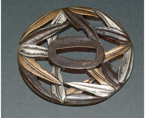 A signed bronze Tsuba