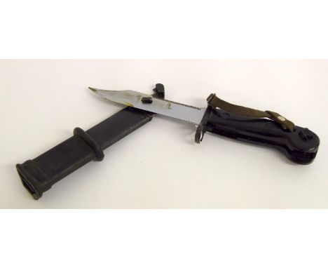 An AKM sawback bayonet / wire cutter in its scabbard having a 15cms blade length