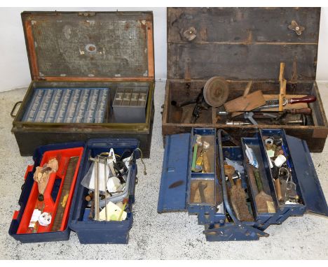 4 tool boxes with a selection of tools