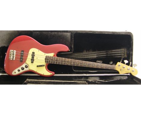 1964 Fender Jazz Bass electric bass guitar, made in USA, ser. no. L21548, red re-finish with various imperfections, missing c